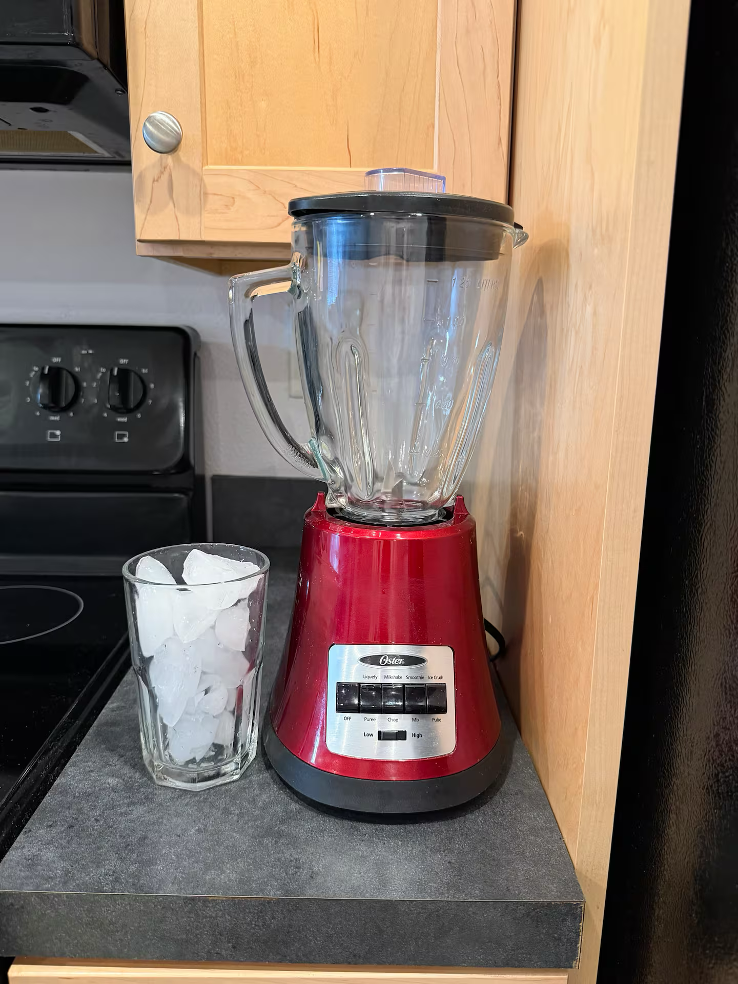 Kitchen amenities and blender at Marlin 305 Cocoa Beach vacation rental