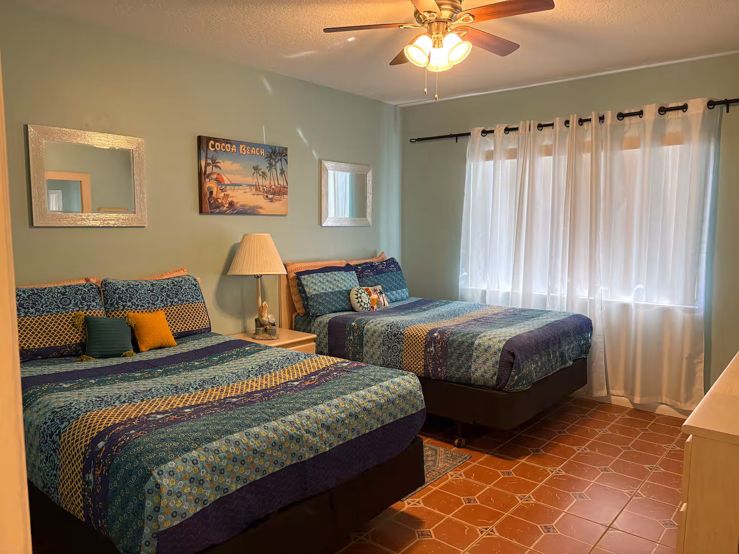 Bedroom with two full-size beds at Marlin 309 Cocoa Beach rental