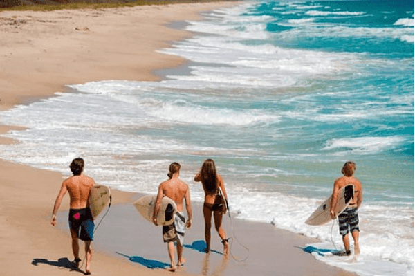 Surfers enjoying Melbourne Beach Florida