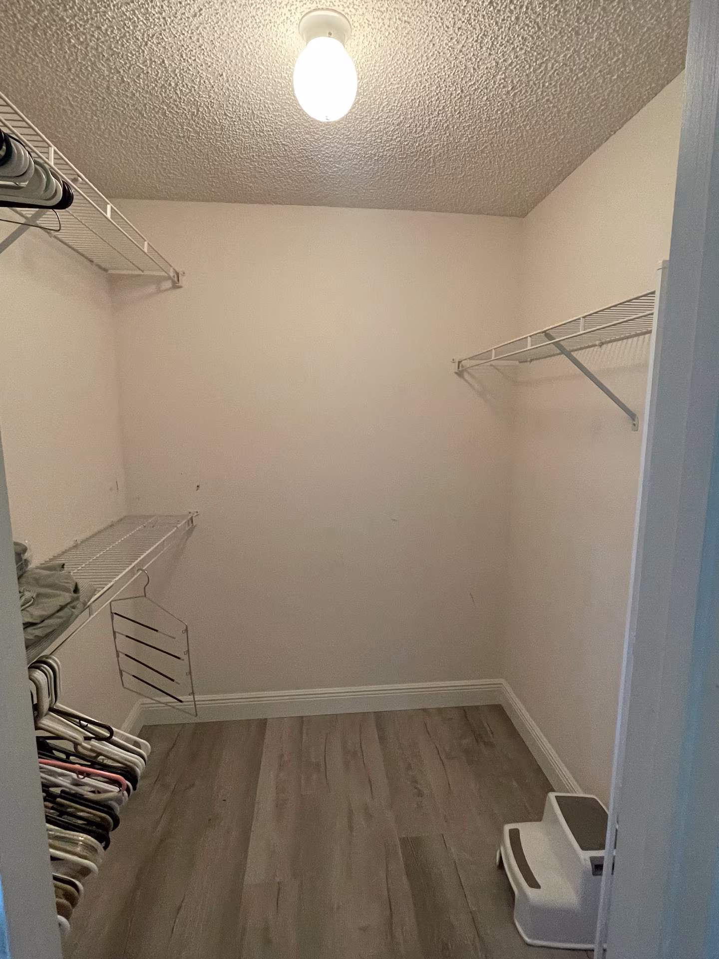 Primary bedroom closet at Palm Bay Retreat