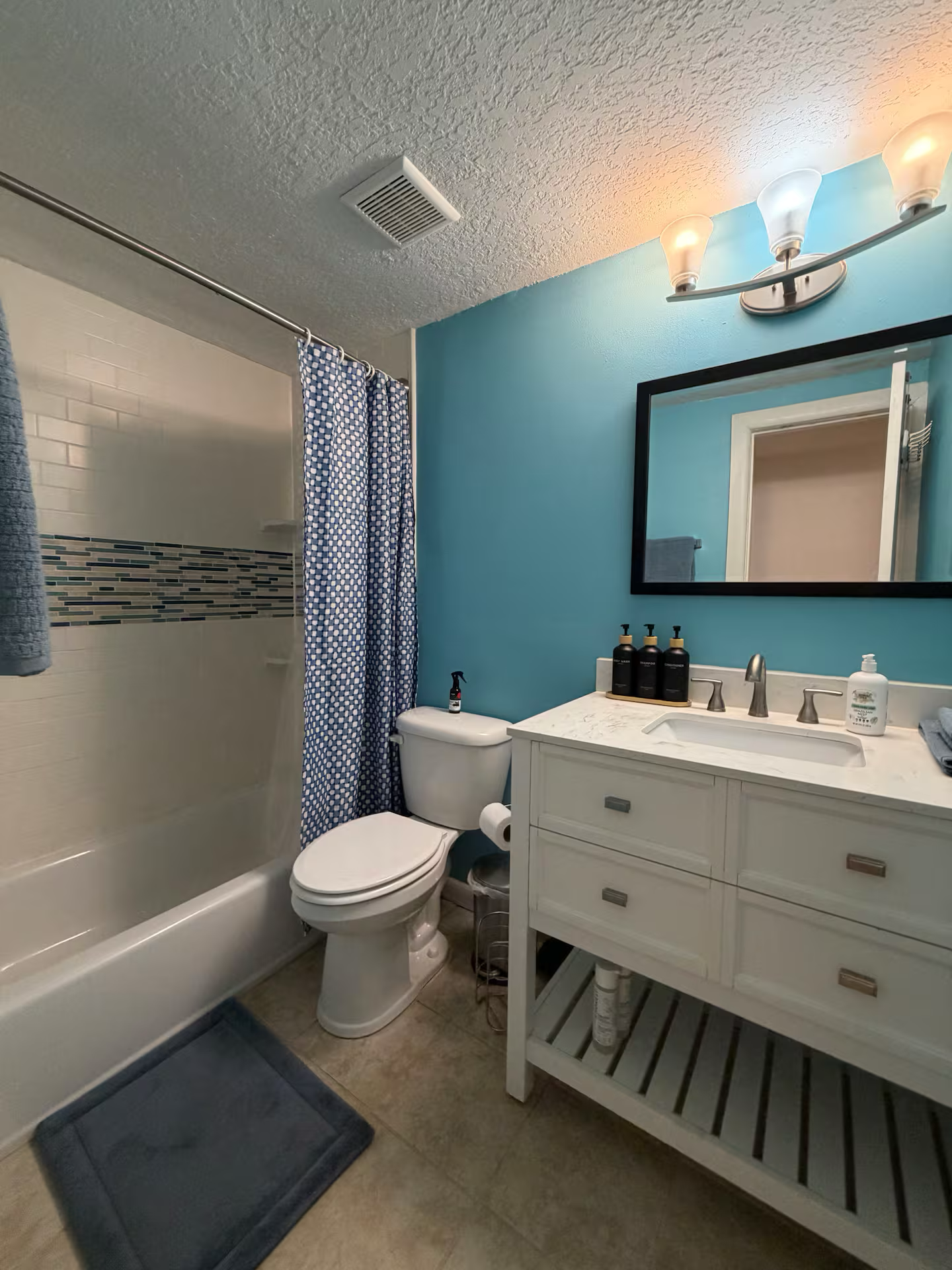 Clean vacation rental bathroom prepared for guests